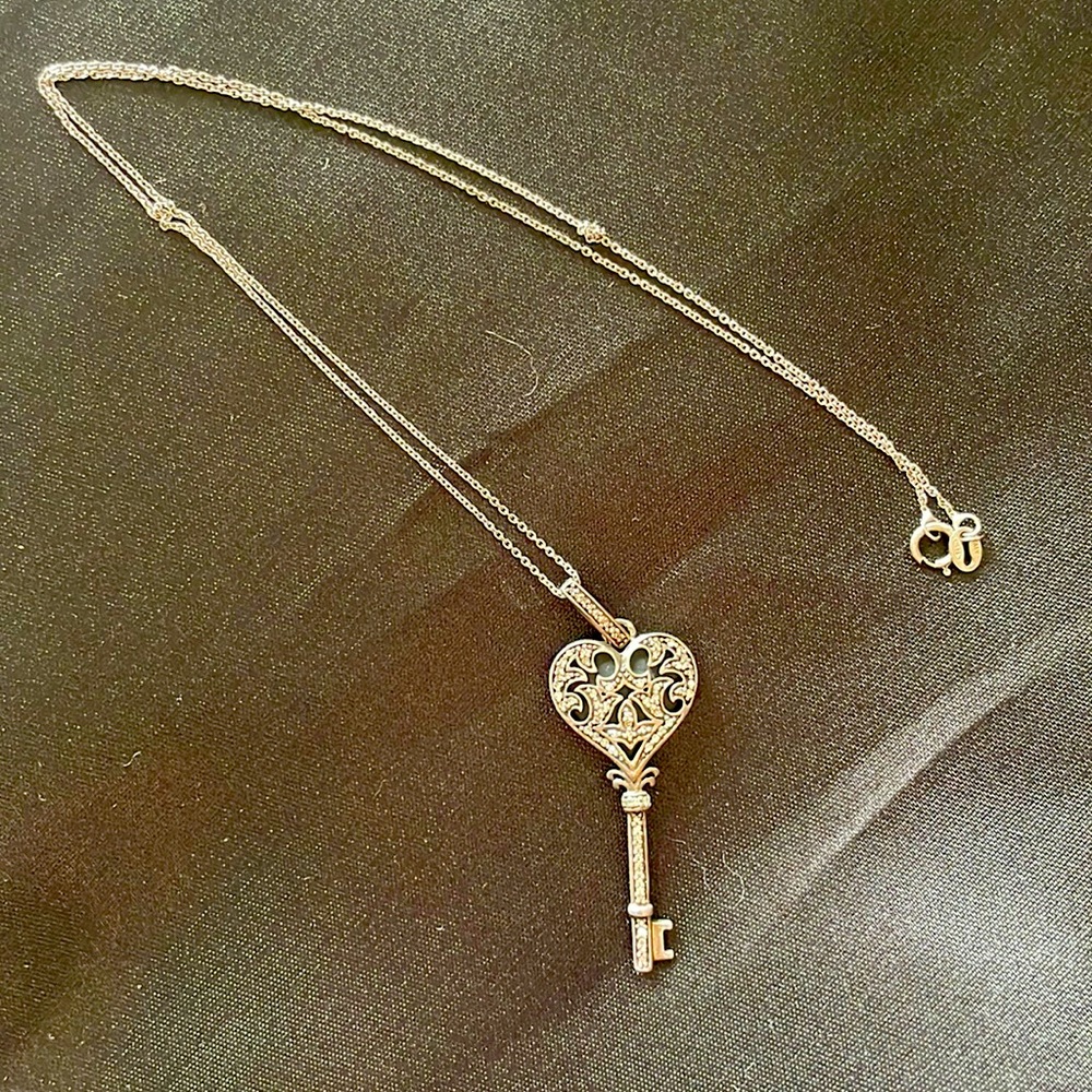 Silver and diamond vintage key